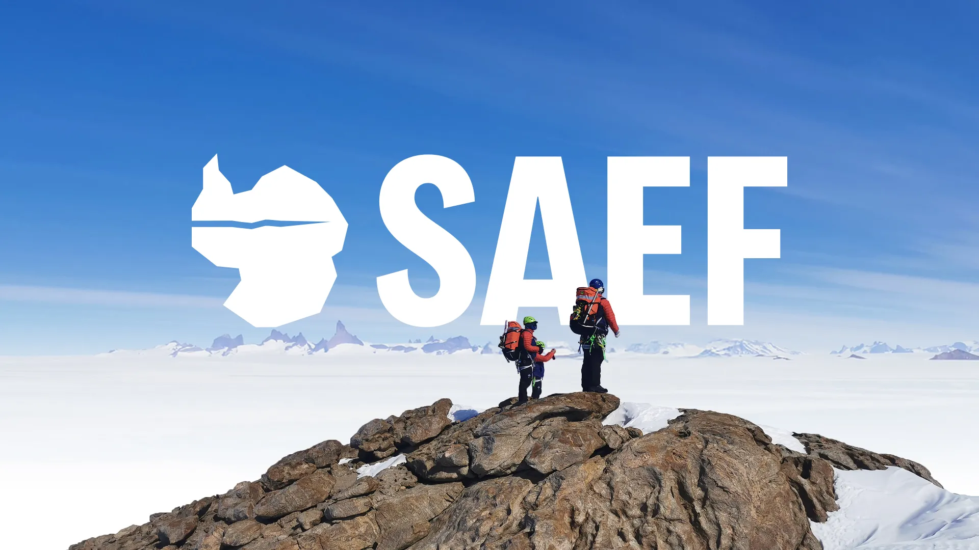 The SAEF brand mark and wordmark set over two field-team members on a rocky outcrop above the Antarctic ice sheet.